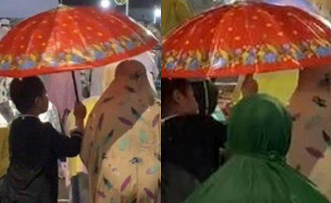 [VIDEO] Netizen ‘Cair’ Tengok Budak Lelaki Payung Ibu Sedang Solat Dalam Hujan