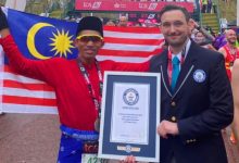 Pelari Maraton Lari Dengan Baju Melayu Bulan Bintang, Pecah Rekod ‘Guinness World Records’