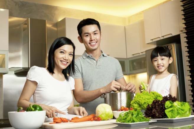 Asian Family spending time together in the kitchen