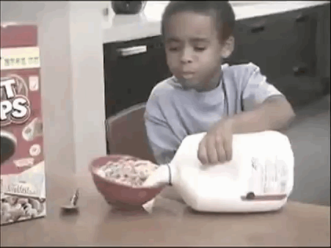 kid-trying-to-pour-milk-informercial-gif